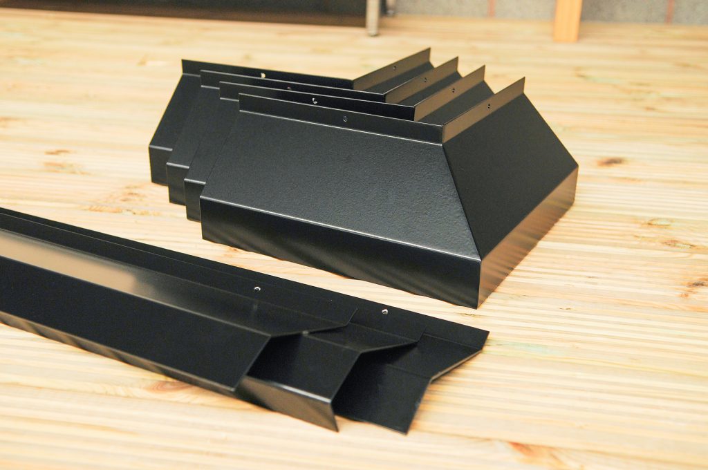 black-corner-pressing-x